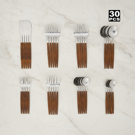 30-piece cutlery set on cream marble
